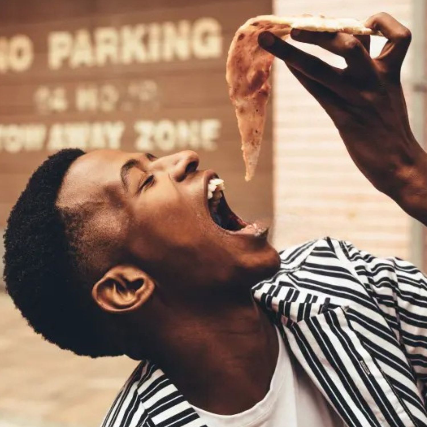 Enjoying pizza made in a portable gas pizza oven South Africa